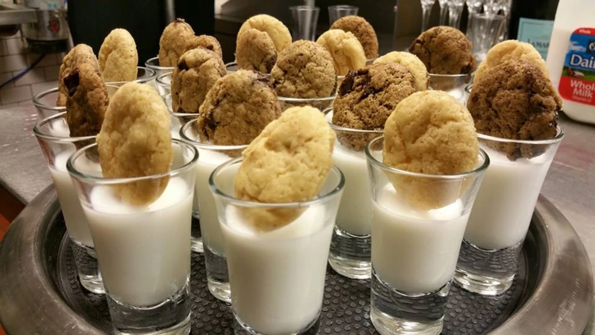 Cookies served with mini milk shots