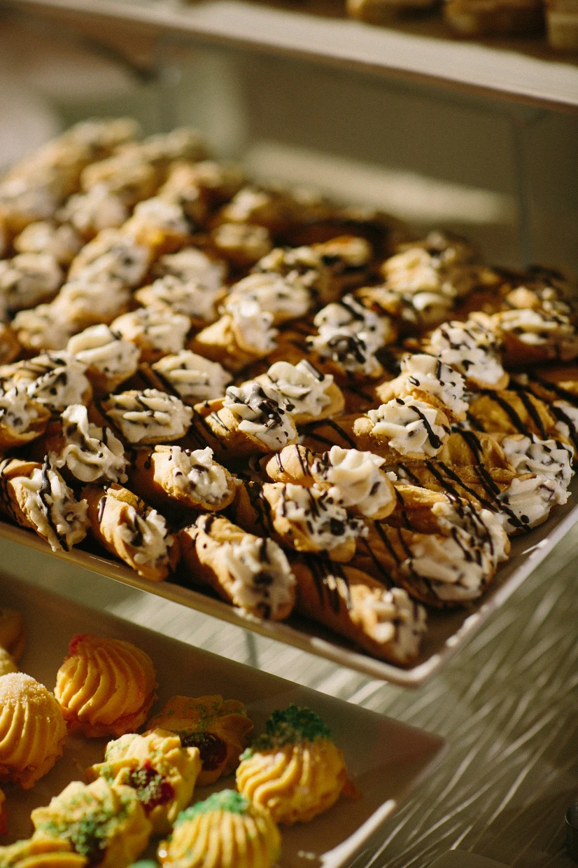 Cannoli and Italian cookie trays on a dessert display